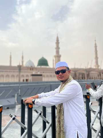 TOMI WIBISONO
