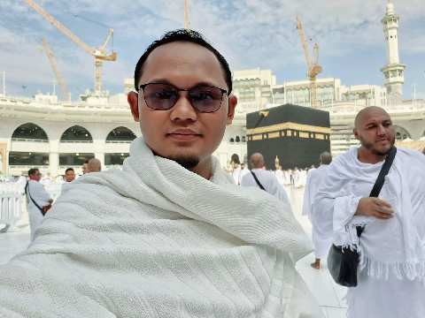 TOMI WIBISONO