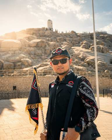TOMI WIBISONO